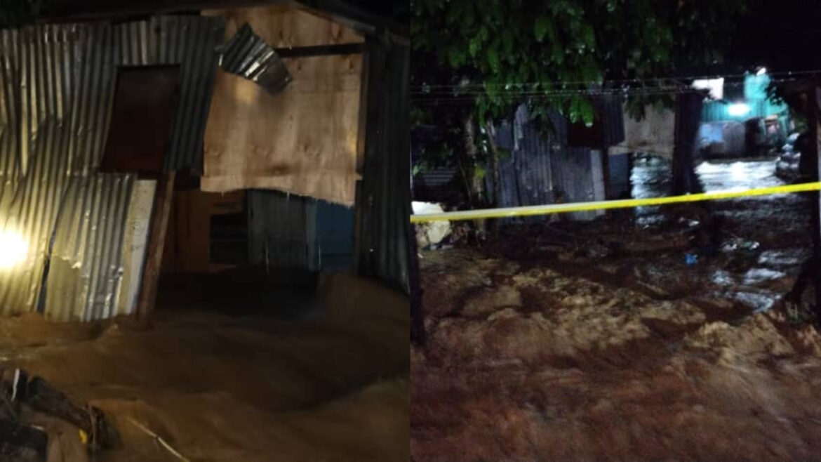 Sebuah rumah rosak akibat banjir di Keningau